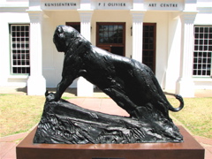 Leopard with snake